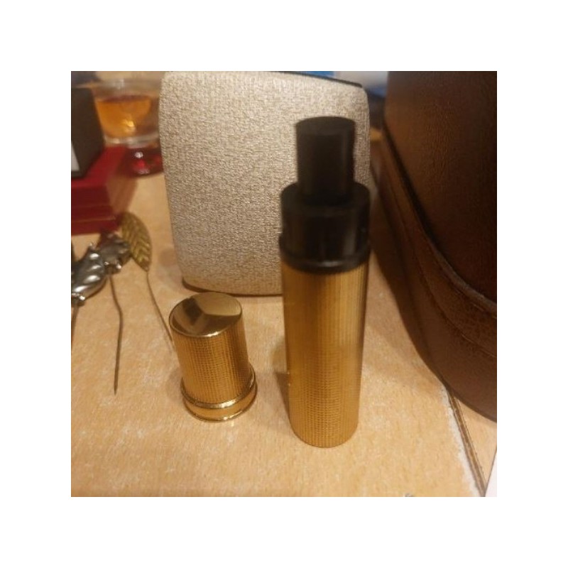 Spray parfum couleur doré 