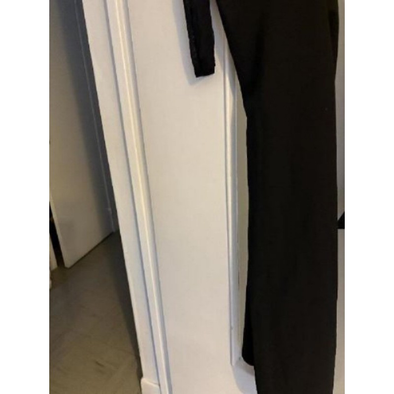 Combi noire femme avec 1 manche taille 36 ou 38 