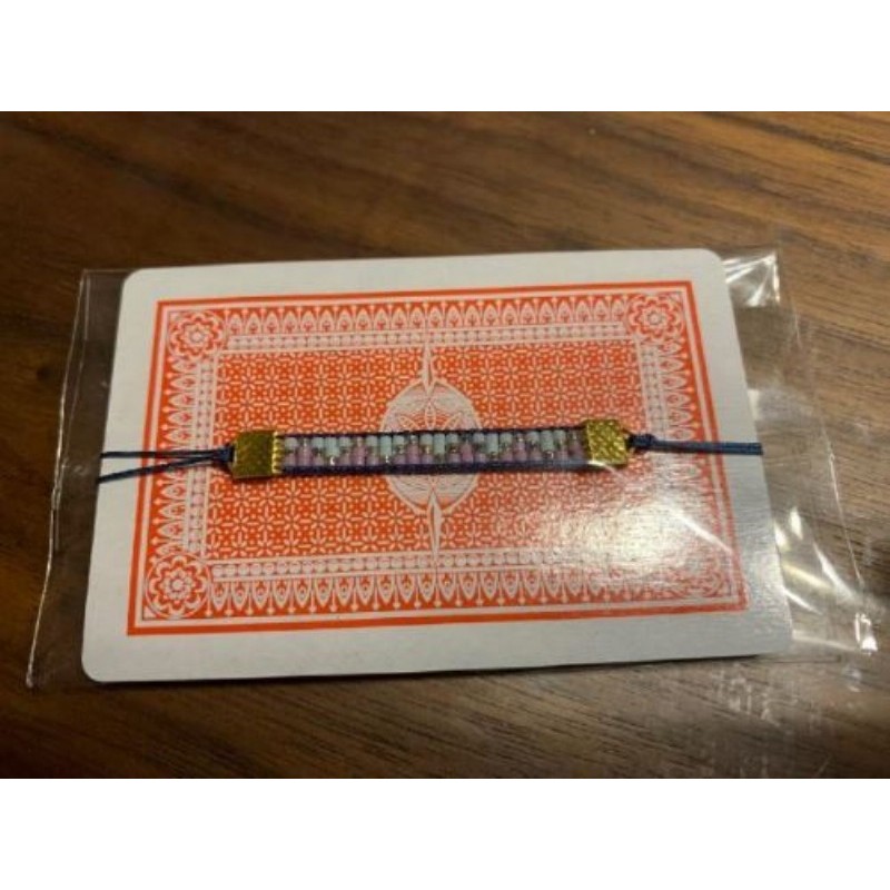 Petit bracelet réglable en perles tissées - neuf