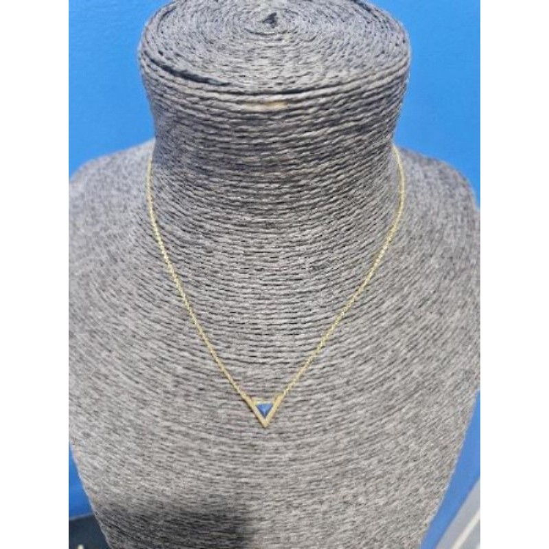 Collier doré et pierre bleue