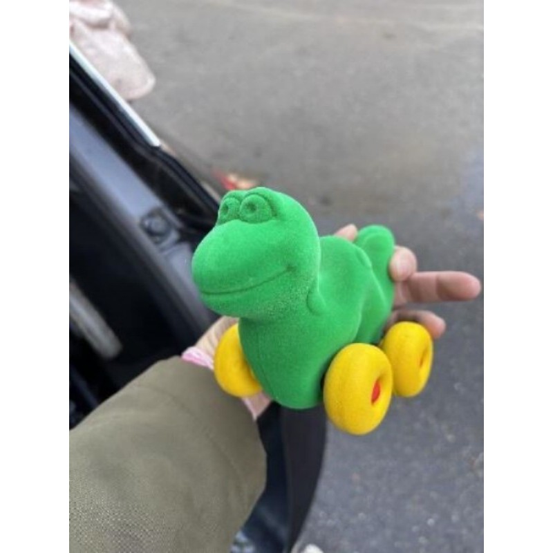 Crocodile sur roues vert et jaune 