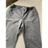 Pantalon femme gris T 44 pierres sur bordures poches devant