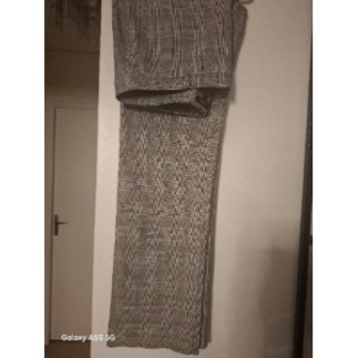 Pantalon a carreaux Prince de Galles noir , blanc et jaune. neuf, Taille 44