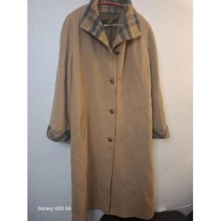 Manteaux en laine beige...