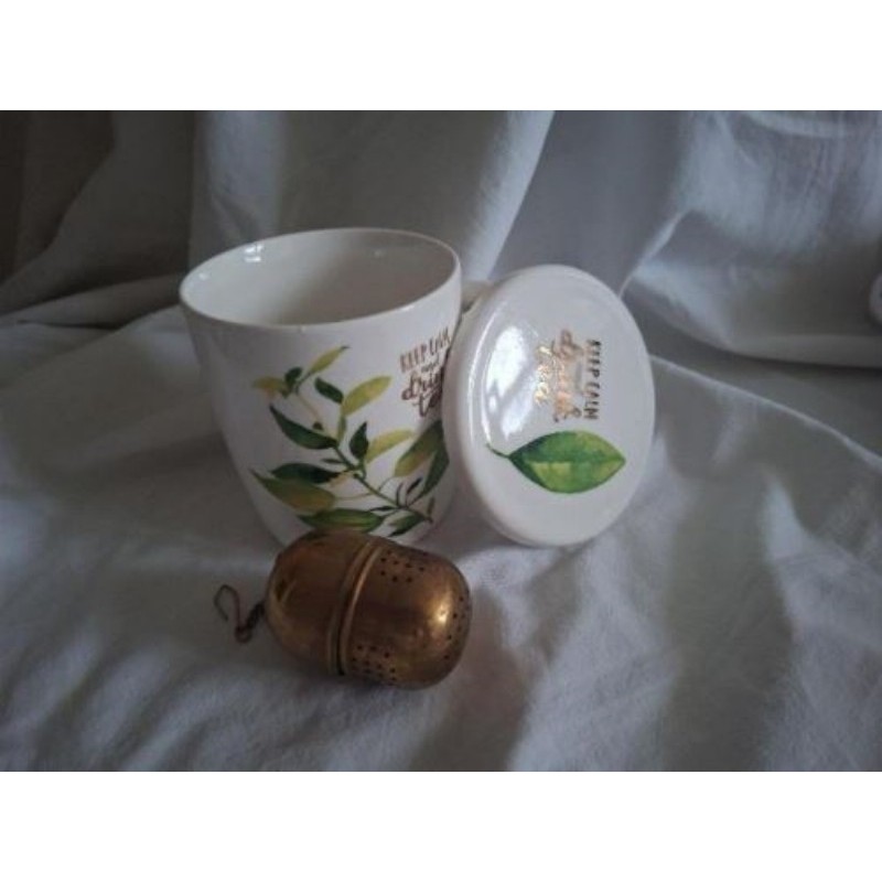 Mug avec couvercle et boule à thé 