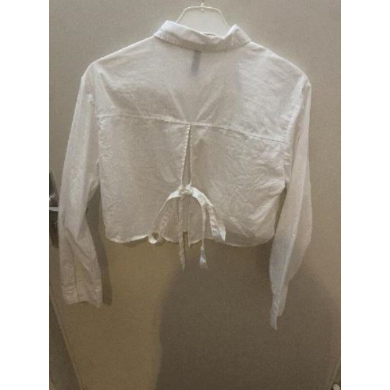 Petit chemise stylé avec une ouverture à l’arrière 