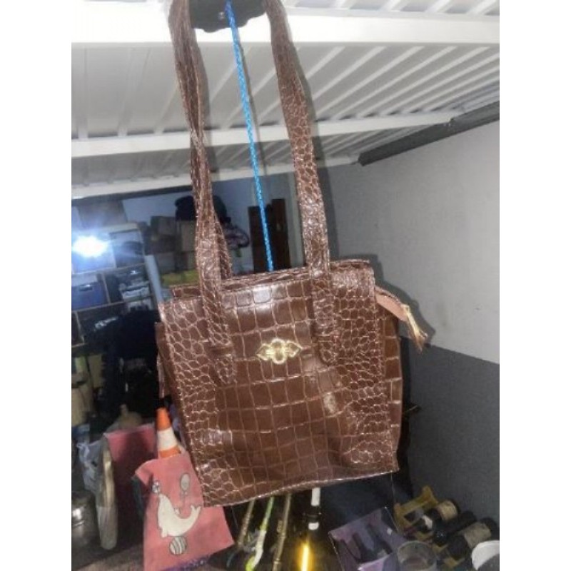 Jolie sac marron en cuir de serpent 