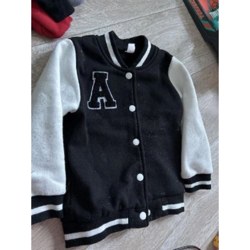 Veste noire et blanche 3 ans 