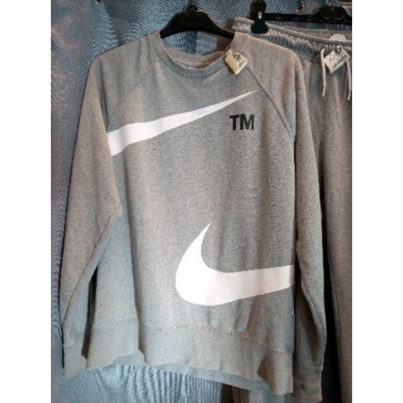 NIKE sweat gris T.M (bas vendu séparément)