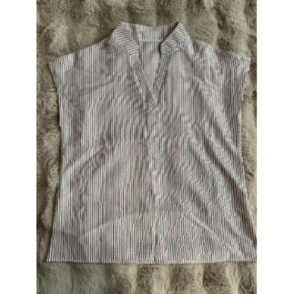 Blouse sans manches rayée...