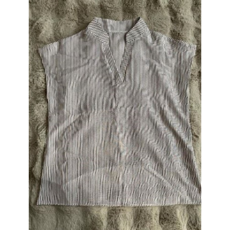 Blouse sans manches rayée beige et blanche taille M