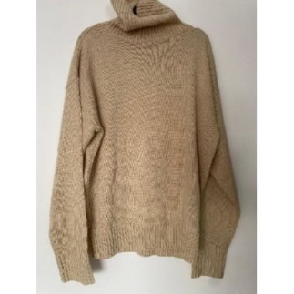Pull beige col roulé