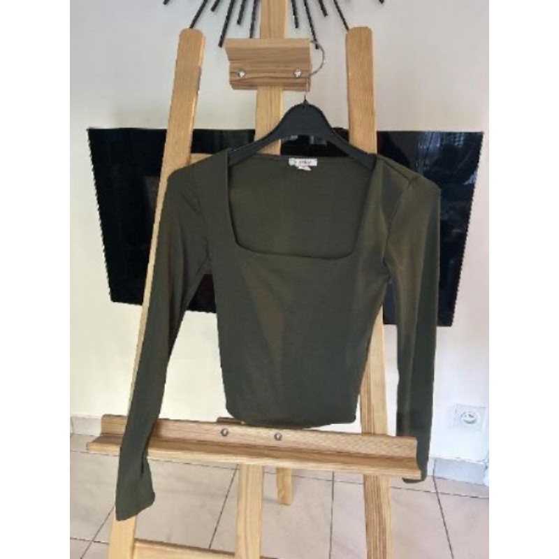 Haut vert, New Yorker taille XS