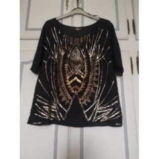 Blouse noire à sequins...