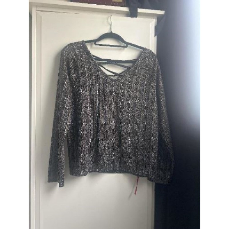 Haut noir et doré taille 40/42 