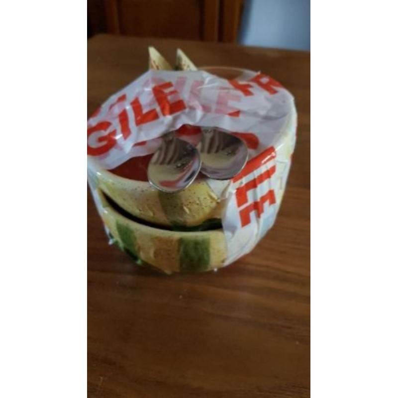 2 bols à melon avec cuillères. 