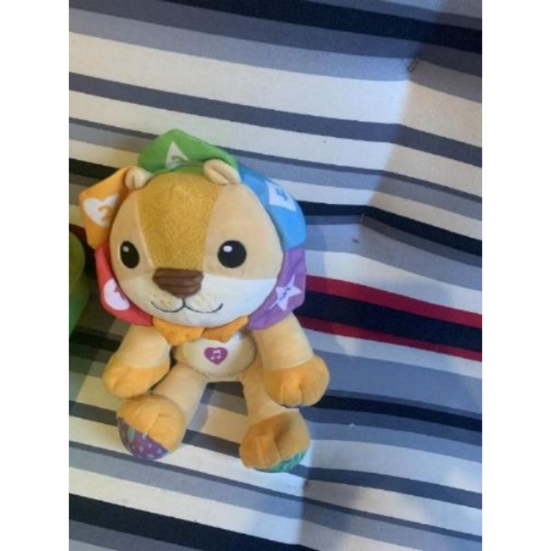 Peluche lion musical