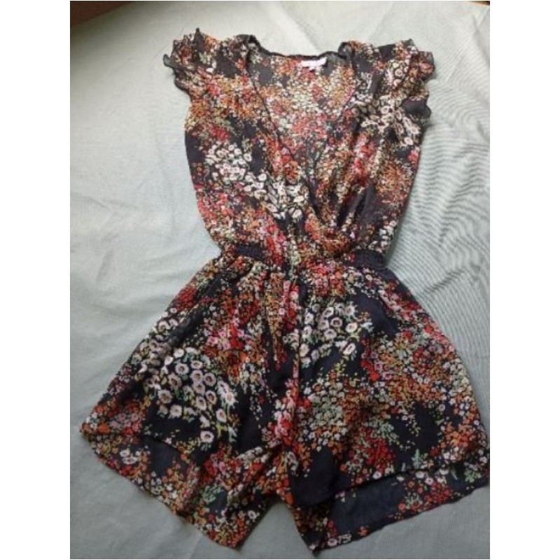 Combishort noir avec des fleur marque be beau taille s