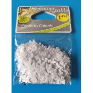 Décoration de la table confettis papillons blancs