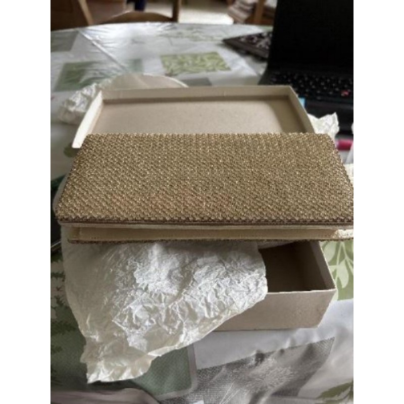 Pochette CAPION dorée 