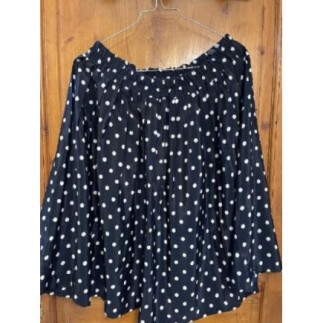 Jupe noire avec pois blancs...