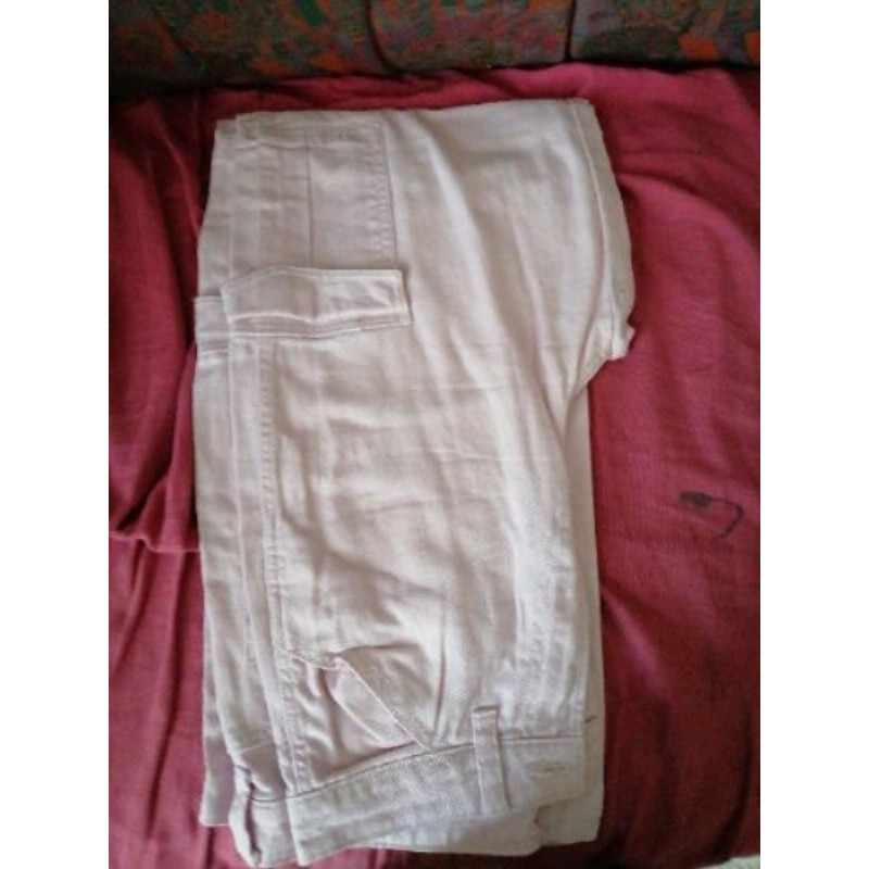 Jean rose taille 34 a poche 