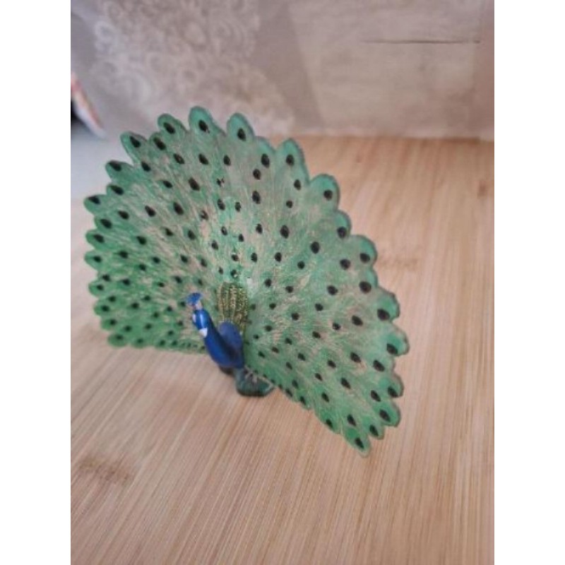 Figurine paon