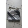 Sac noir et argent, bandoulière et chaine. Très bon état. 