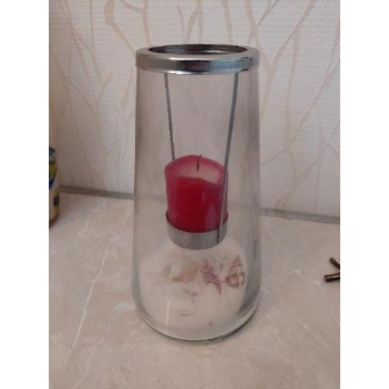 Lanterne décorative avec sable et coquillages