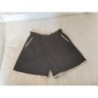 Short noir et doré ikks, réversible, 7 ans, très bon état 