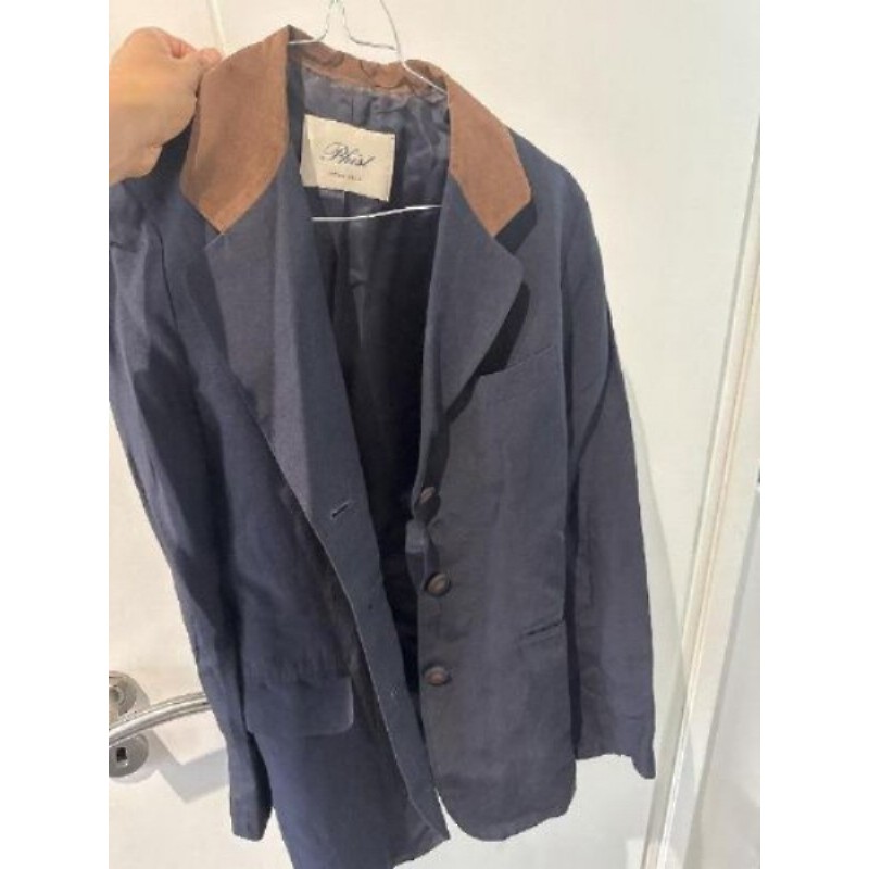 Blazer femme bleu marine avec col marron et boutons bleus et marron 