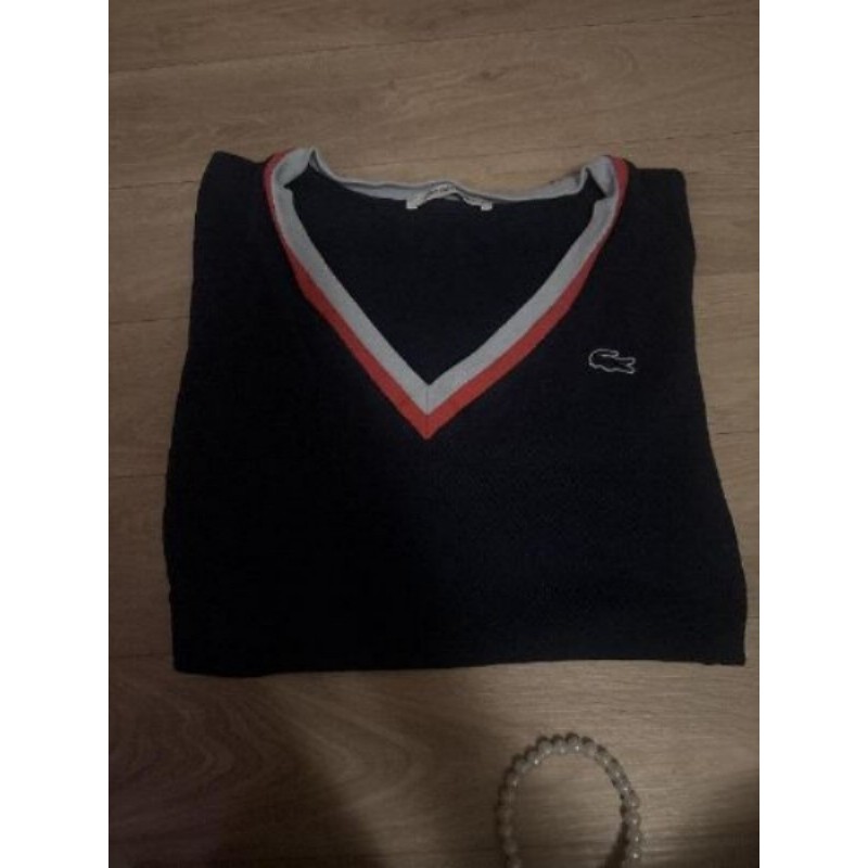 Polo Lacoste bleu nuit taille 34/36 col V 