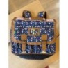 Cartable Tann’s bleu et fleurs roses
