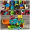 Garage marque Vtech tut tut bolide + 18 voitures et une caravane