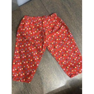 Pantalon mixte rouge à pois...