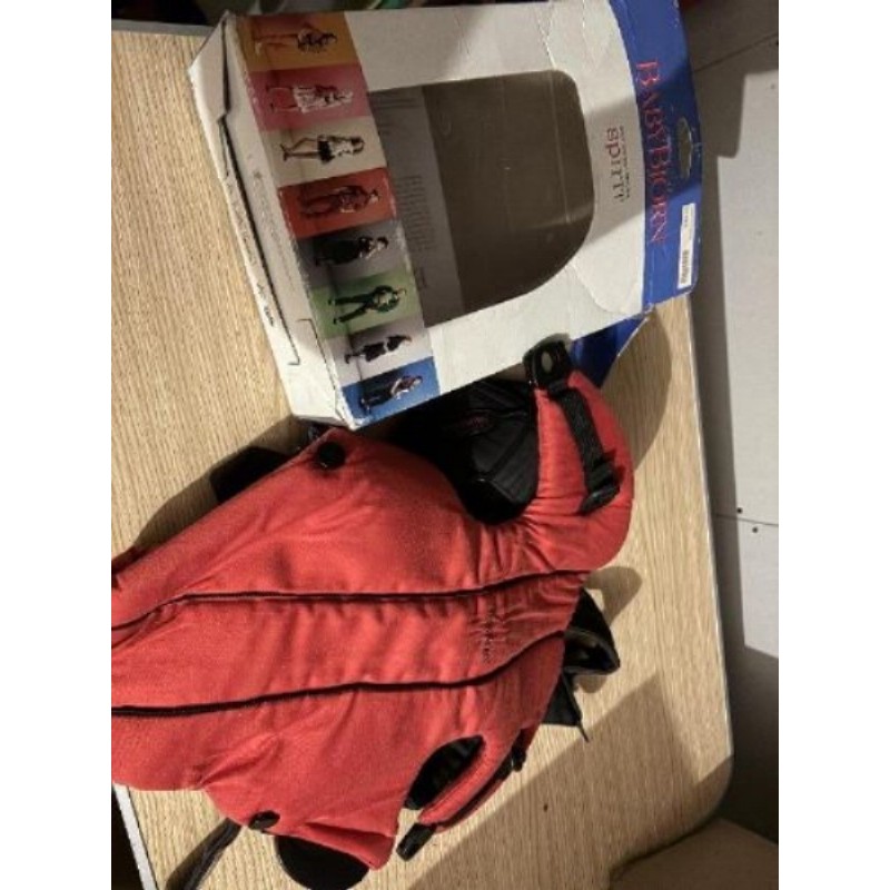 Porte bébé Babybjorn rouge parfait etat