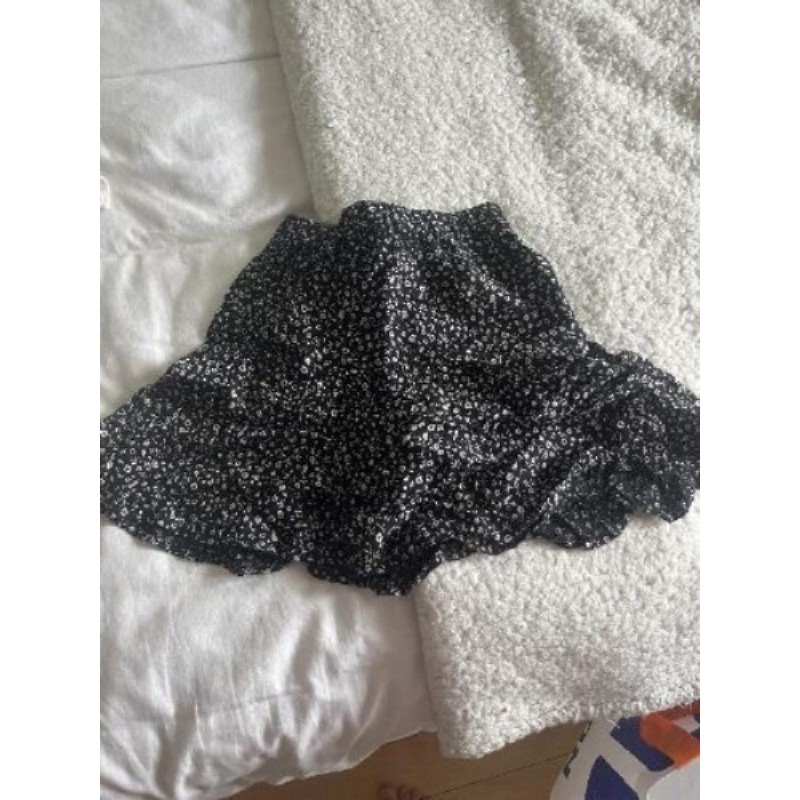 Jupe short noir à fleurs Kiabi taille XXS 