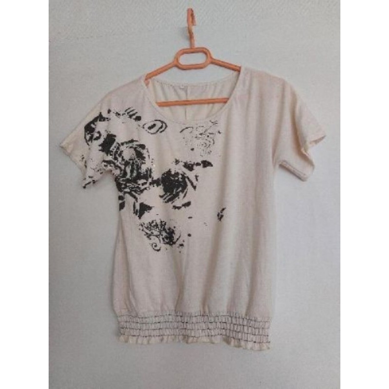 Tee-shirt beige motifs noirs - Taille M