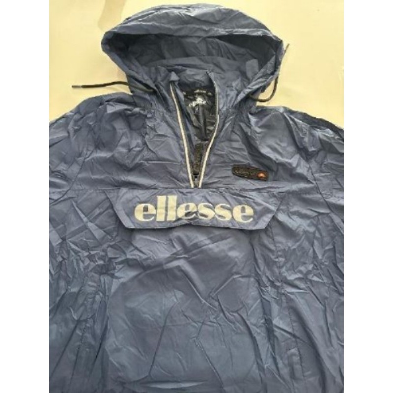 Vêtement anti pluie bleu marque Ellesse taille M