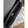 Cartable noir de la marque Delsey, état, impeccable, avec clé du cadenas, état neuf