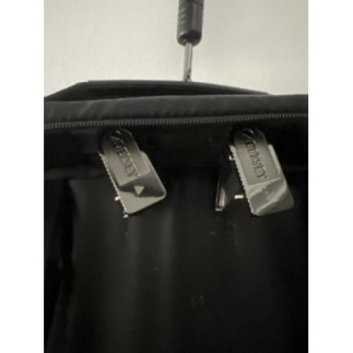 Portant  voyage pour costume, très bon état, Marque Delsey, couleur noir