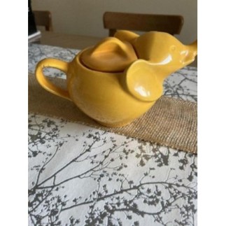 Théière, éléphant, orange