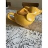 Théière, éléphant, orange