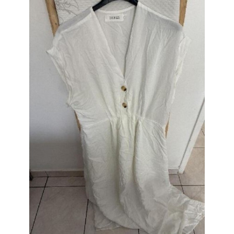 Robe blanche sans manches sénés taille ML 