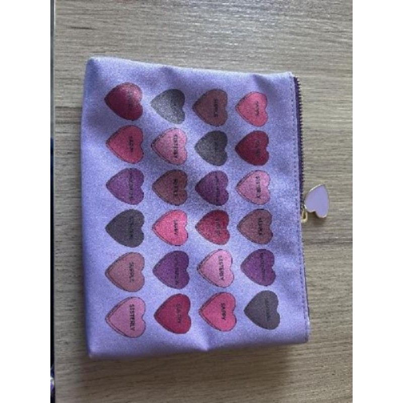 Pochette violette cœurs 