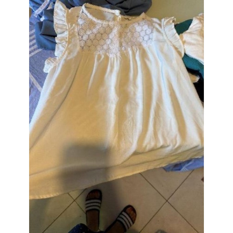 Chemise sans manches blanches taille s