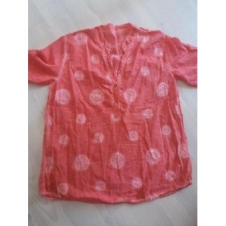 Blouse orangée à motifs...