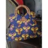 Sac en tissu Wax Africain bleu fleurs jaunes poignées en rotin