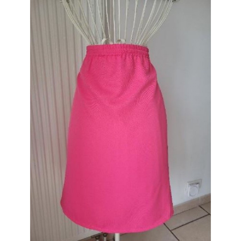 Jupe couleur fushia. Taille 44 élastique. Sans marque