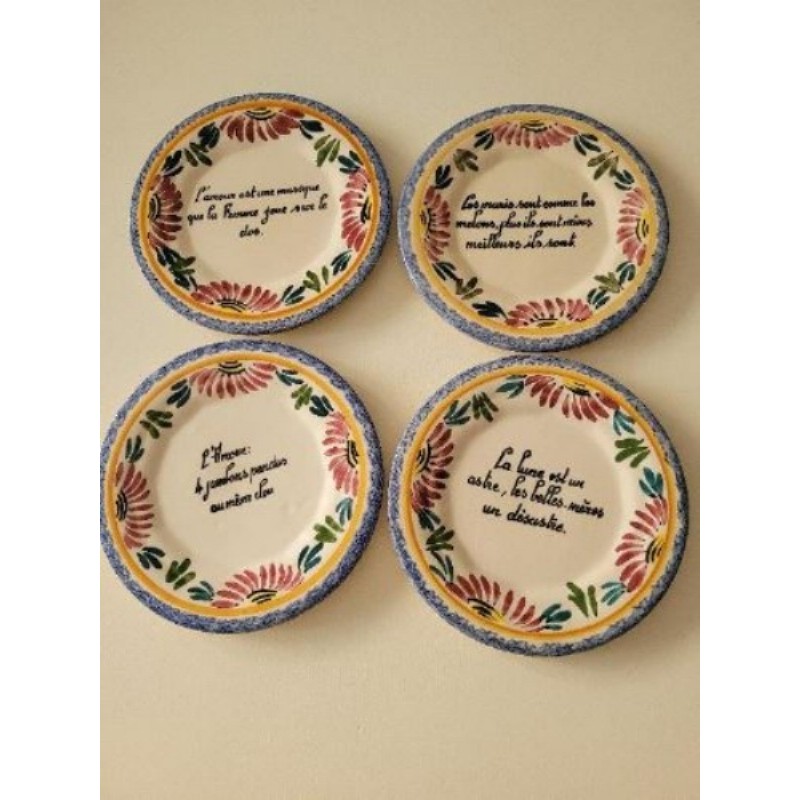 Lot 4 petites assiettes signé le Mont St Michel 
